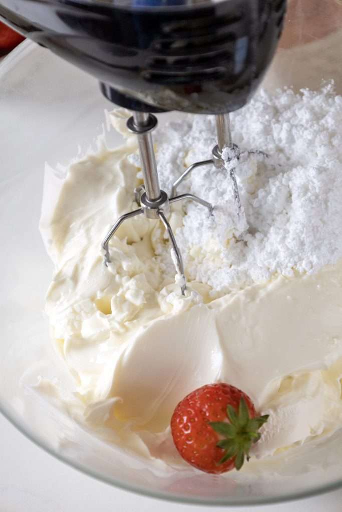 Mix together the softened cream cheese and powdered sugar