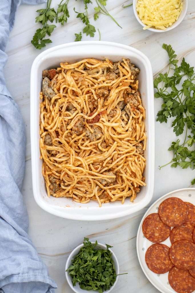 Transfer spaghetti mixture to a deep baking dish.