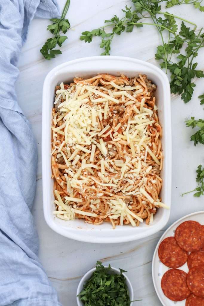 Top with shredded mozzarella cheese.