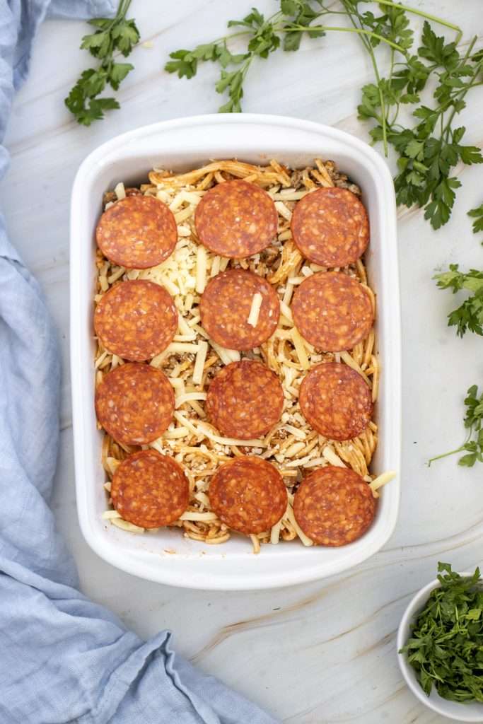 Top with pizza slices.