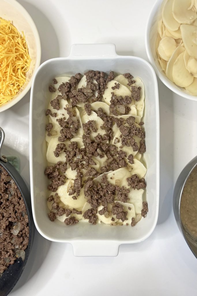 Add half of the meat mixture