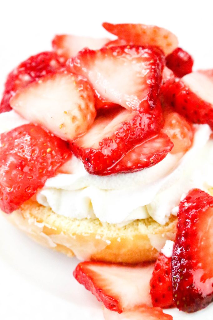 Add strawberries on top of the whipped cream.