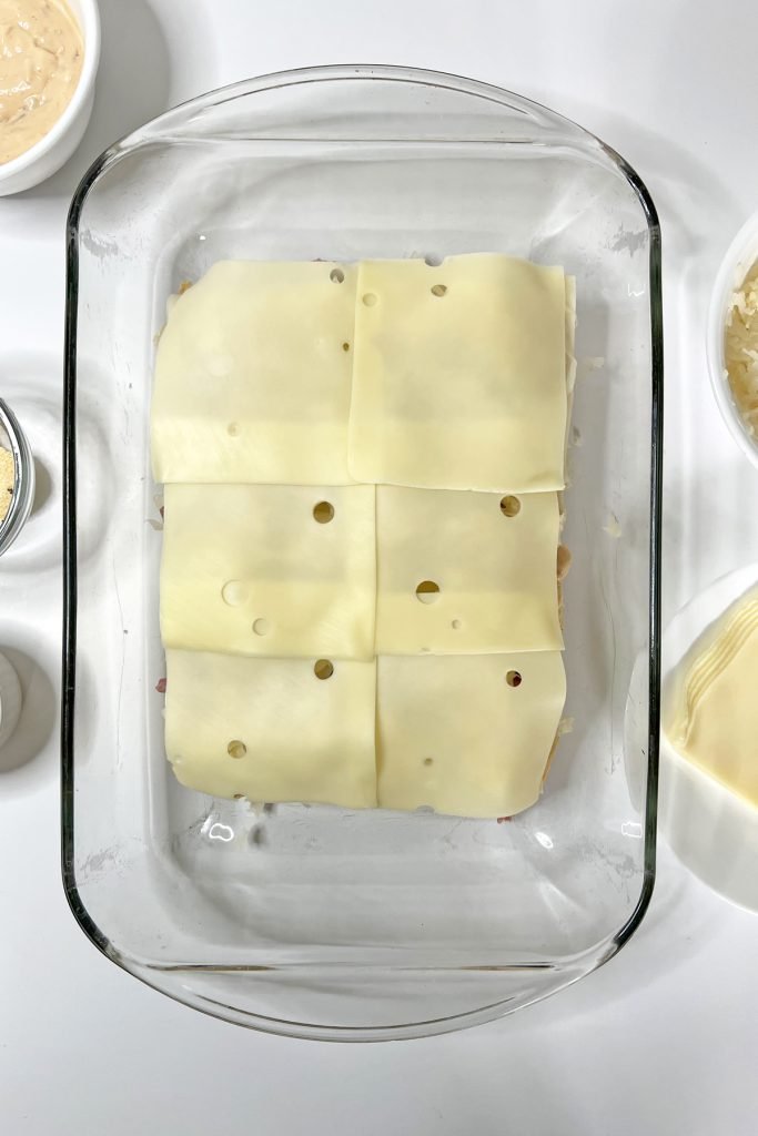 Add another layer of Swiss cheese.