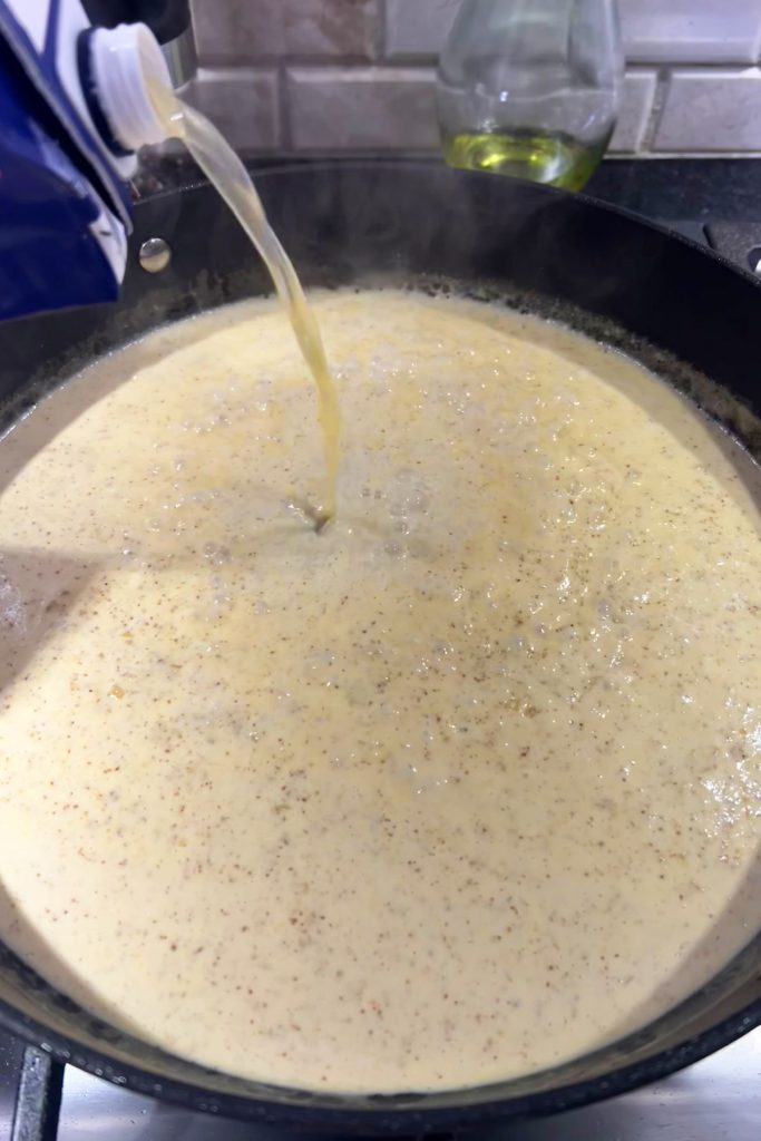 Add chicken broth.