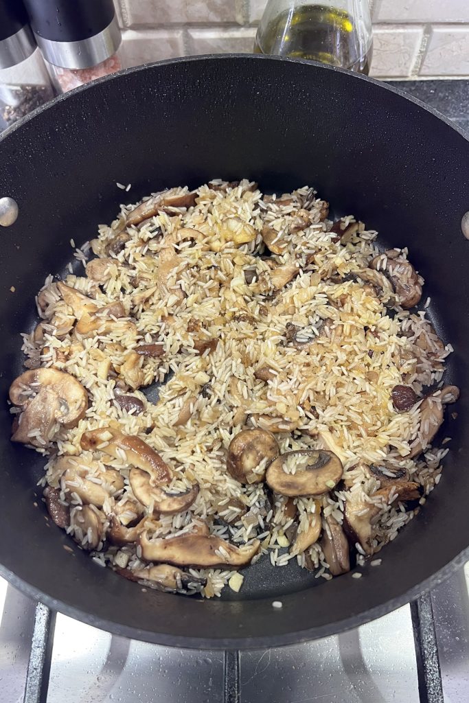 Veggies and rice in a pan.