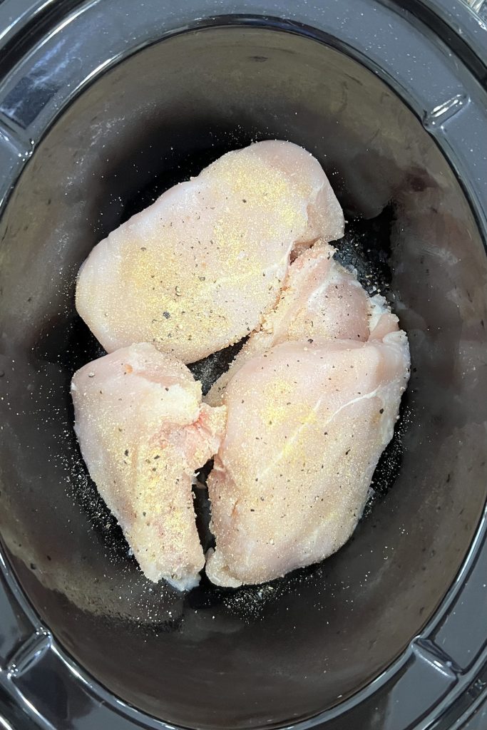 Season chicken breasts