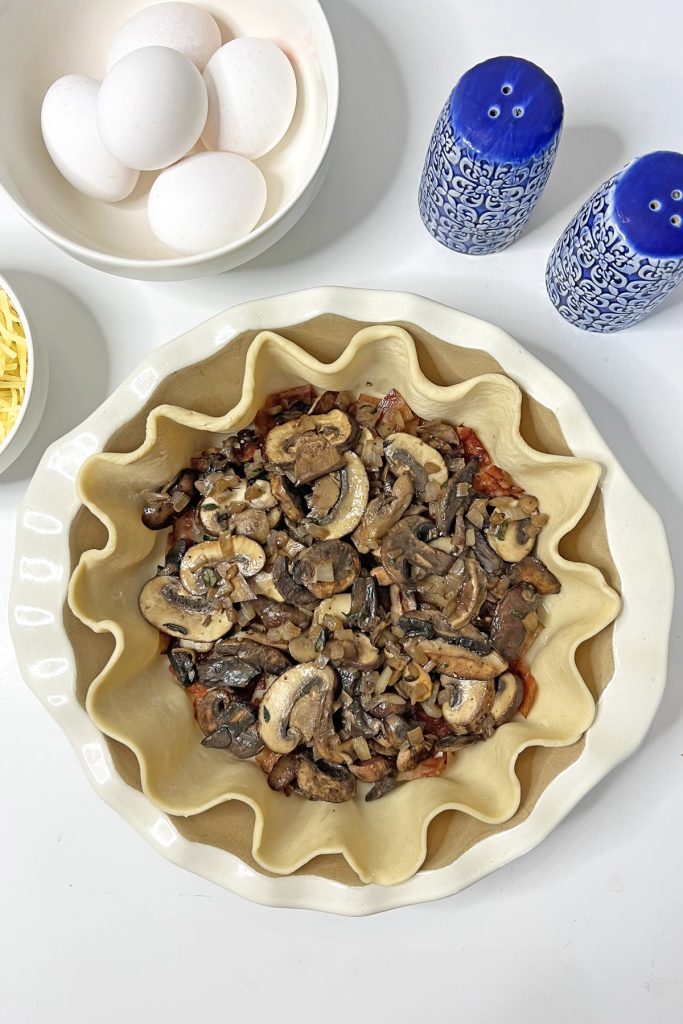 Evenly spread the mushroom mixture.