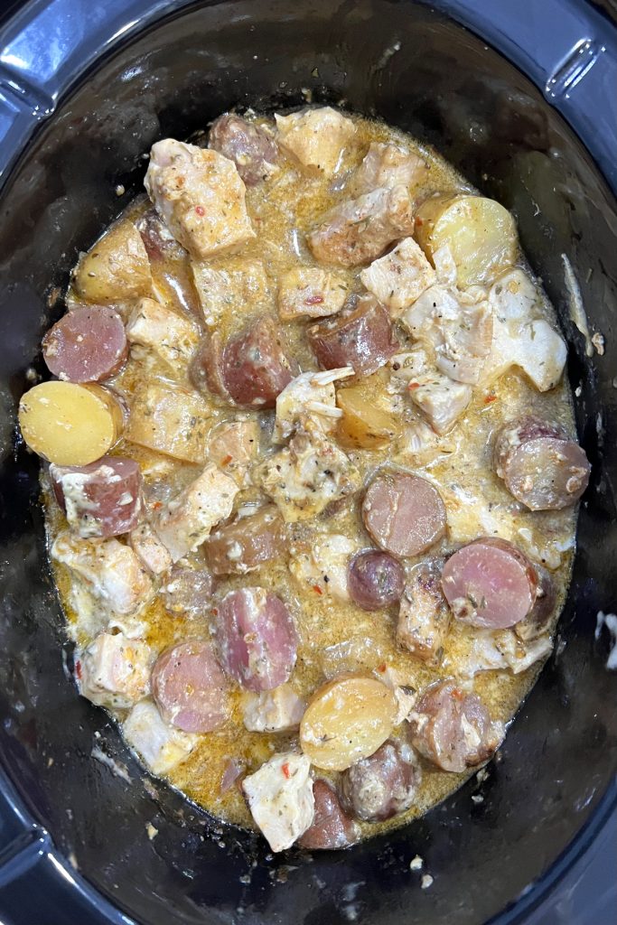 After cooking, stir the chicken and potatoes together.