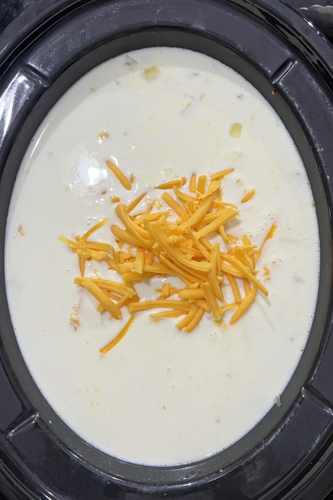 Add shredded cheddar cheese.