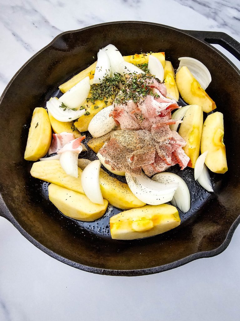 Add bacon, seasonings, and herbs.