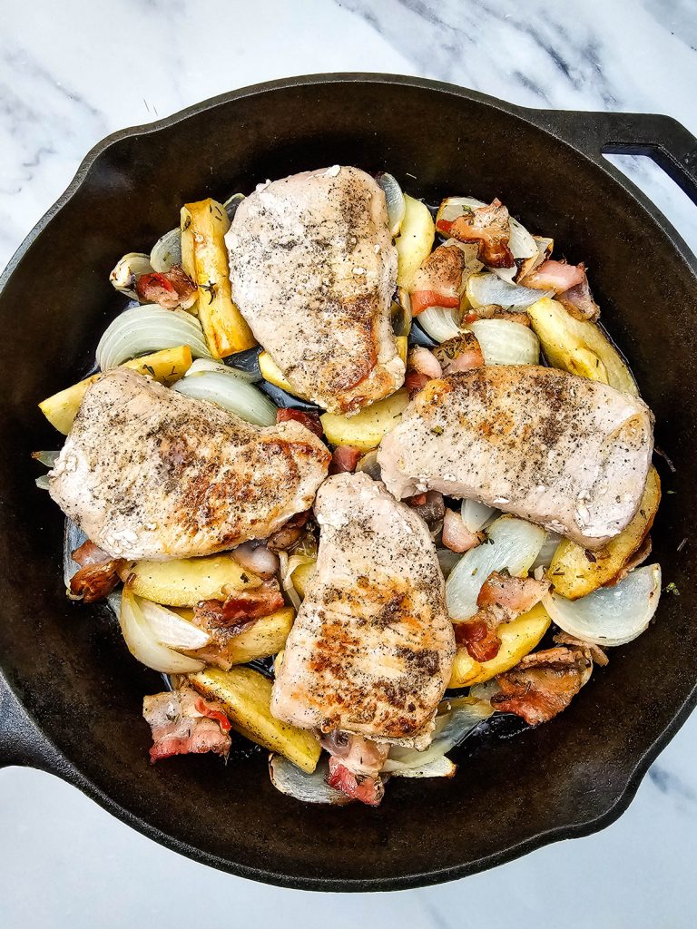Add pork chops back on top and finish in oven.