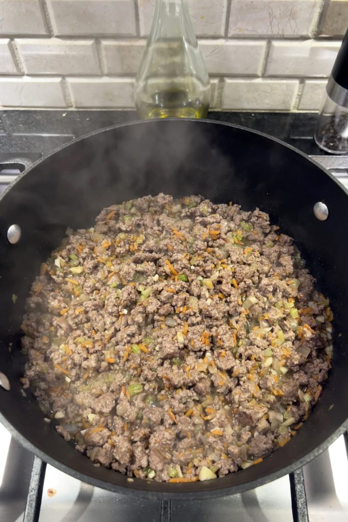 Cook ground beef until browned.