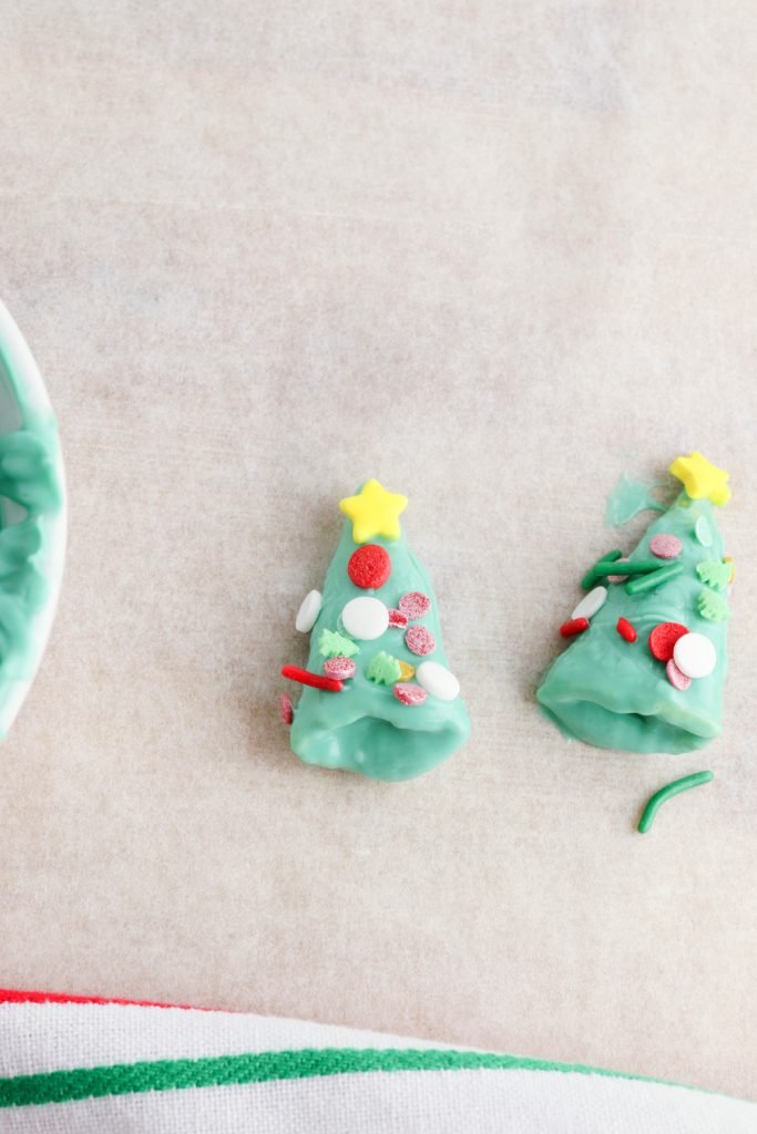 Add sprinkles before the chocolate sets.