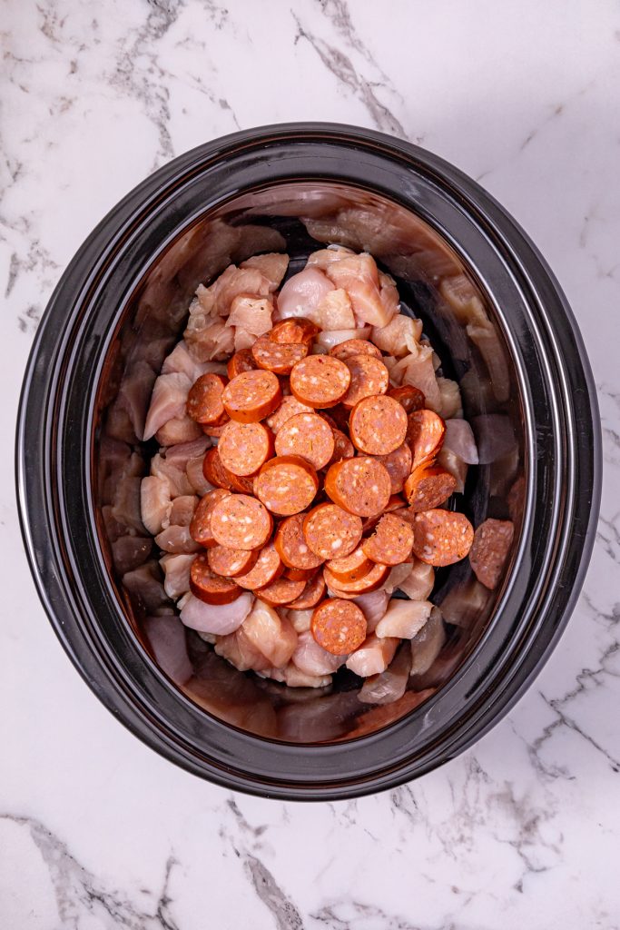 Add sausage and chicken to the crockpot.