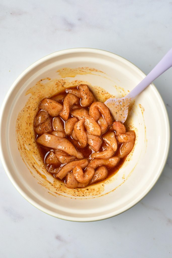 Chicken strips marinating.