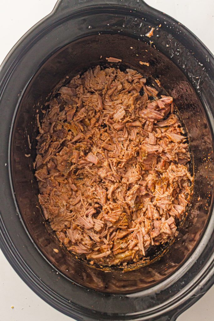 Shredded pork in a crockpot.