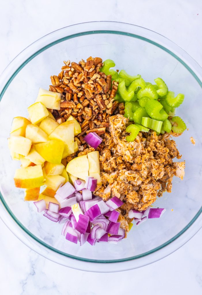 Add prepared ingredients to a bowl.