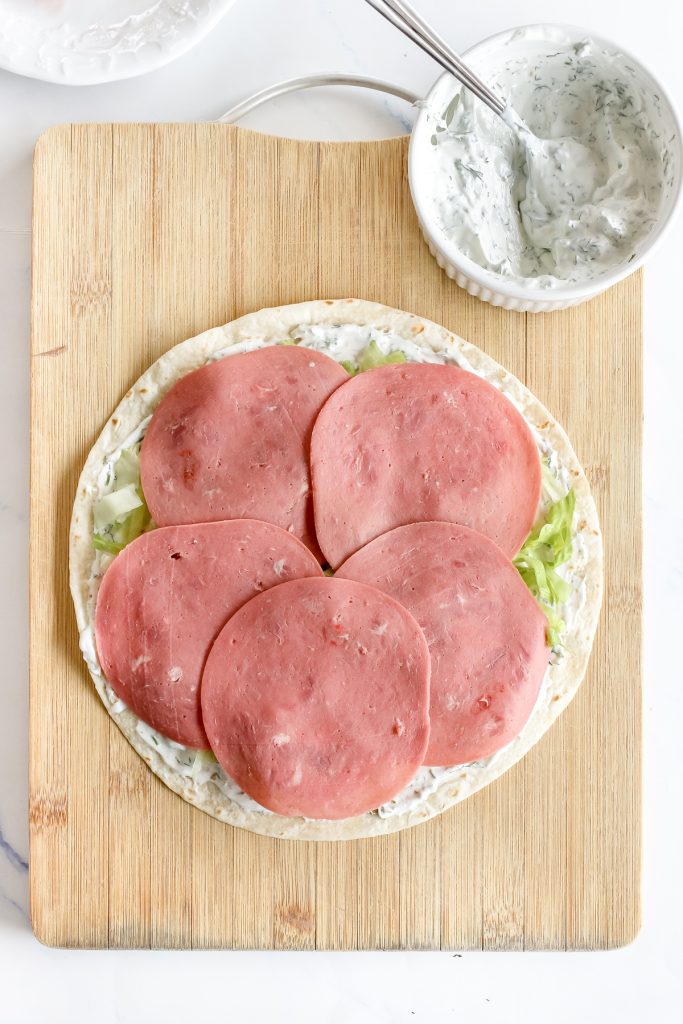 Add a layer of ham or your choice of meats.