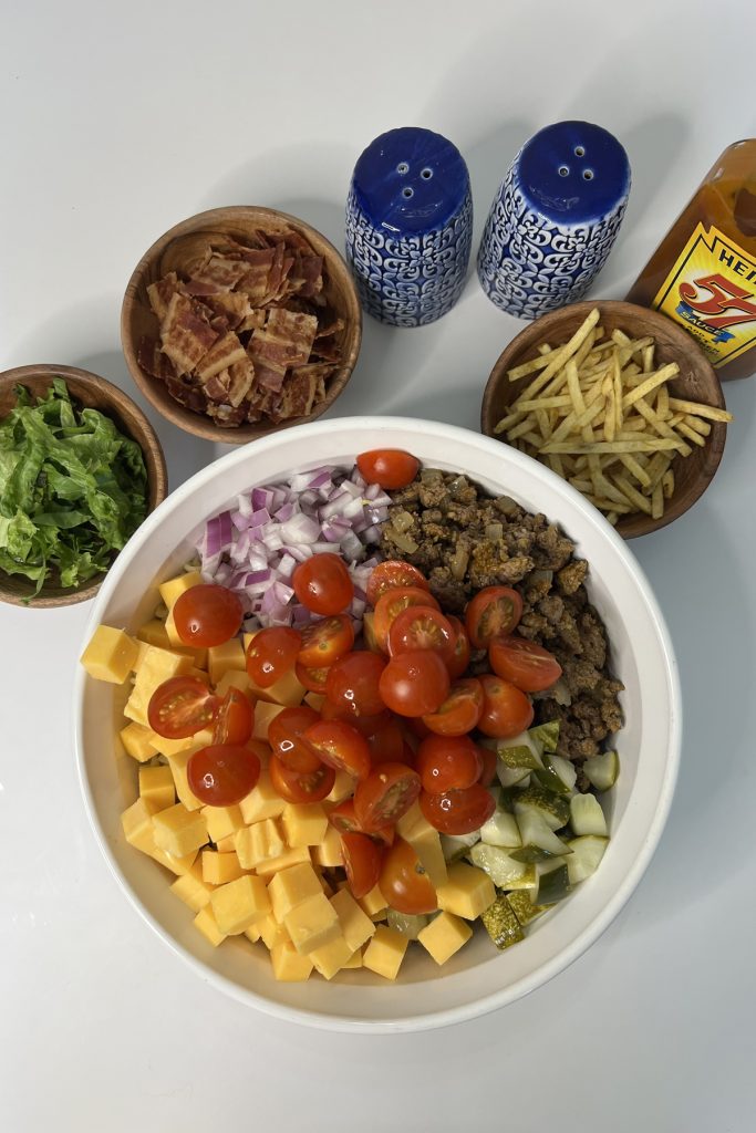 Pasta salad ingredients in a bowl.