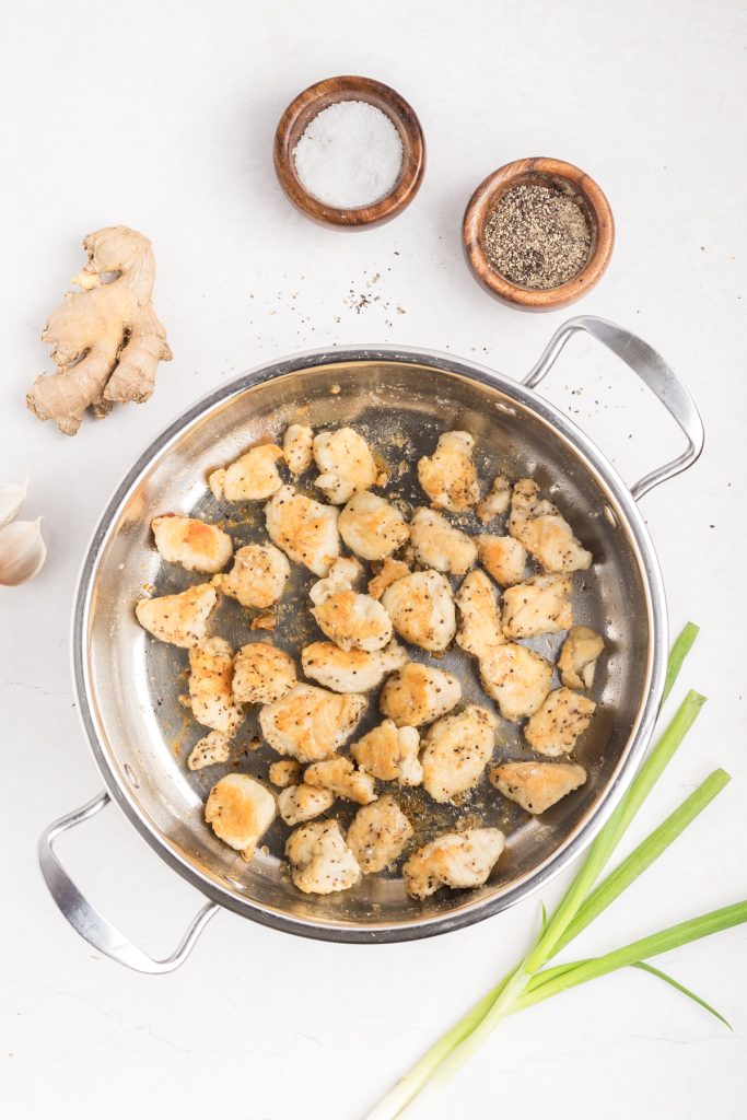 Cook chicken in a skillet.